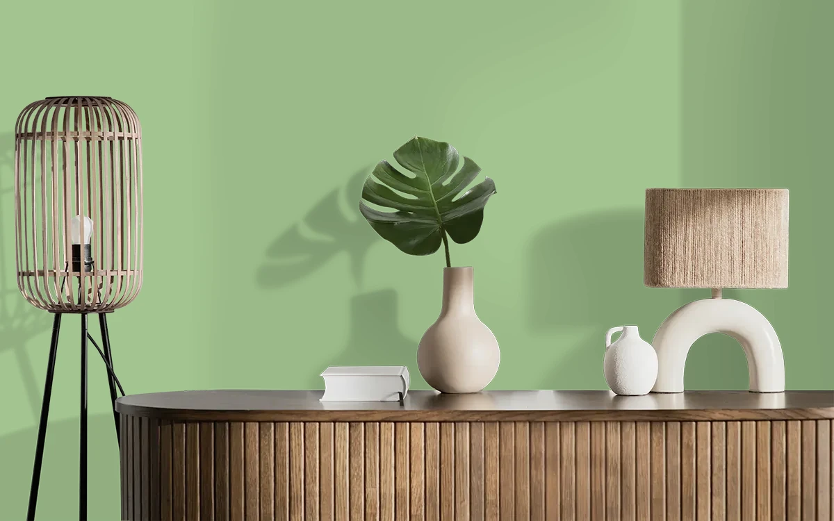 Nippon Paint's LILY STEM color on different wall surfaces.