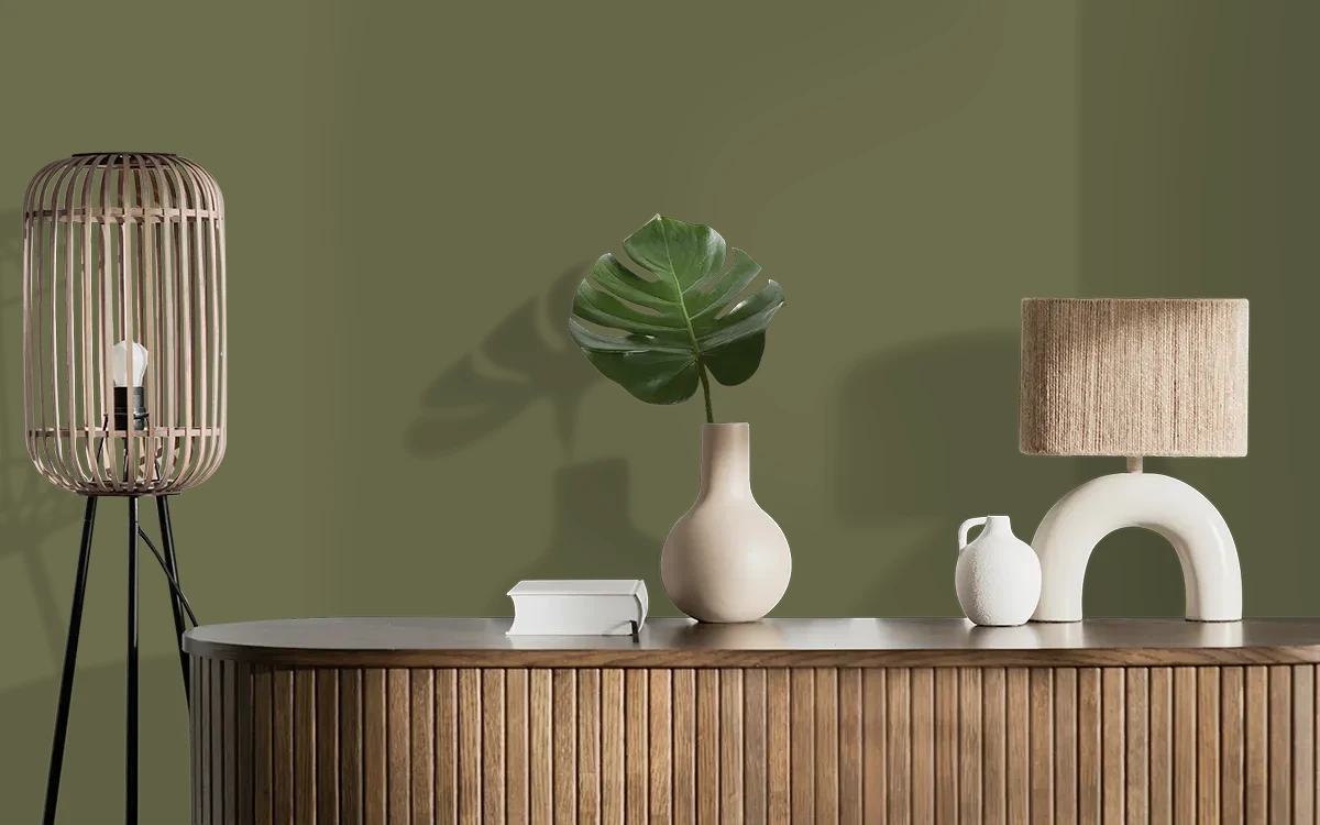 Nippon Paint's LIVIA GREEN color on different wall surfaces.