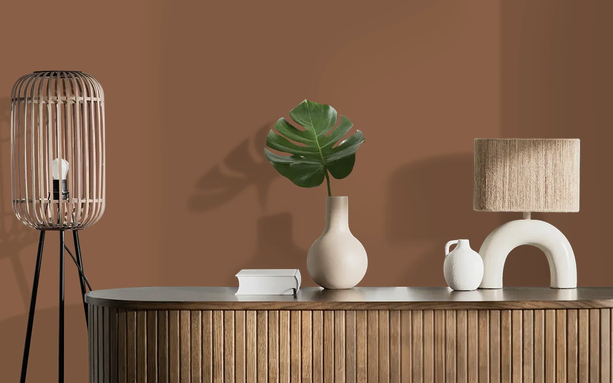 Nippon Paint's MAHOGANY GLOW color on different wall surfaces.