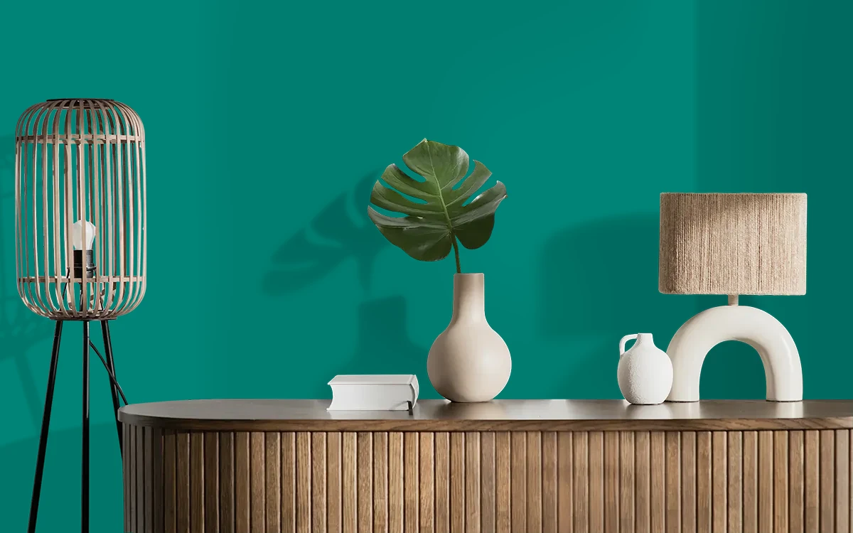 Nippon Paint's MALDIVES SEA color on different wall surfaces.