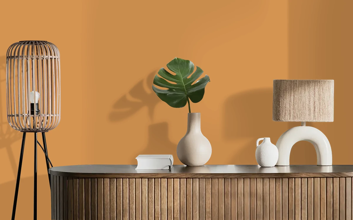 Nippon Paint's MANSION GOLD color on different wall surfaces.