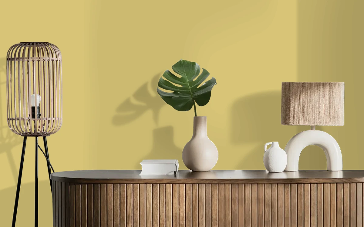 Nippon Paint's MARIGOLD MAGIC color on different wall surfaces.