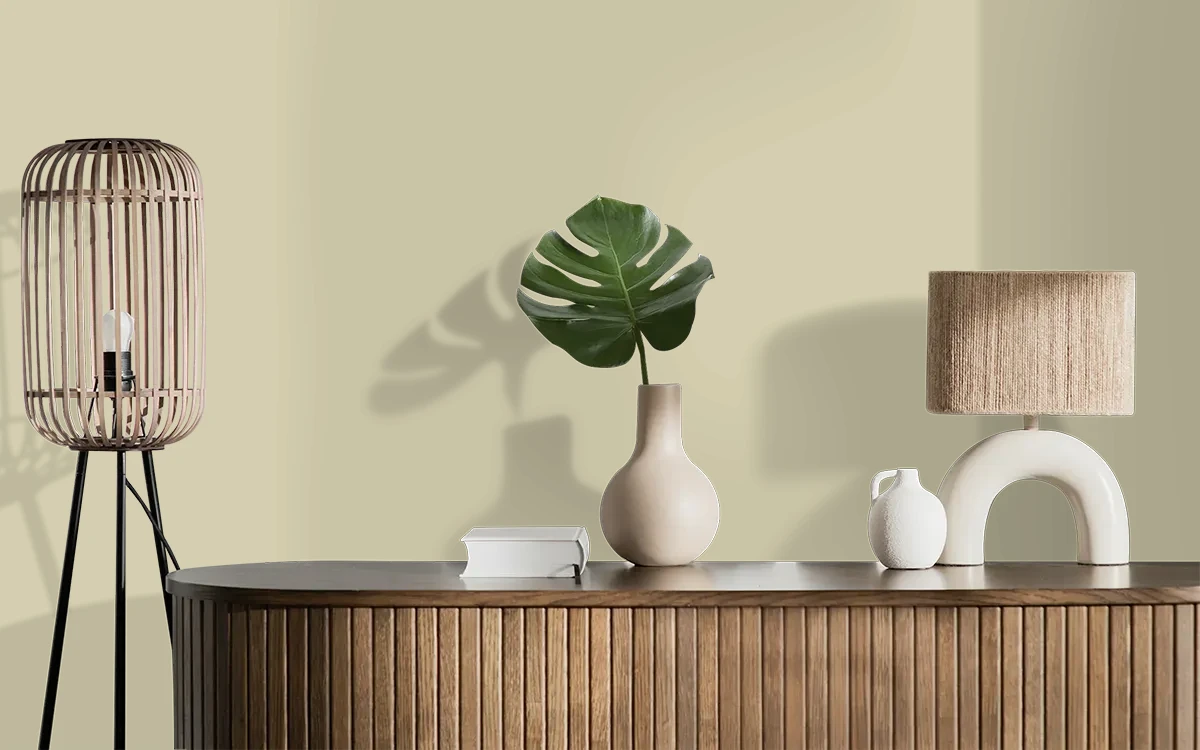 Nippon Paint's MARIGOLD MARVEL color on different wall surfaces.