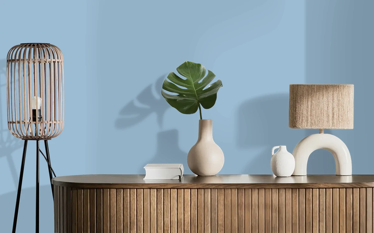 Nippon Paint's MARSHAL BLUE color on different wall surfaces.