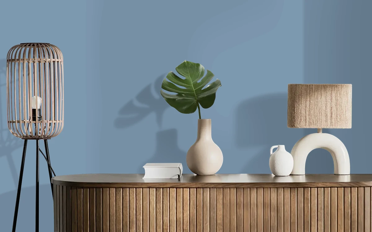 Nippon Paint's MIDNIGHT GLOW color on different wall surfaces.