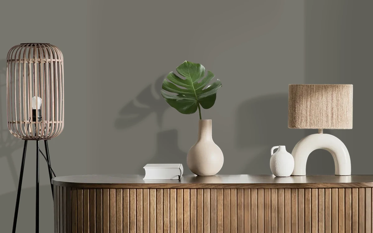Nippon Paint's MILLENIUM GRAY color on different wall surfaces.