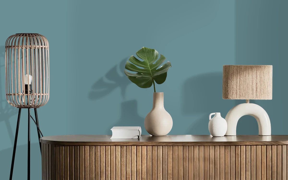 Nippon Paint's MOODY BAY color on different wall surfaces.