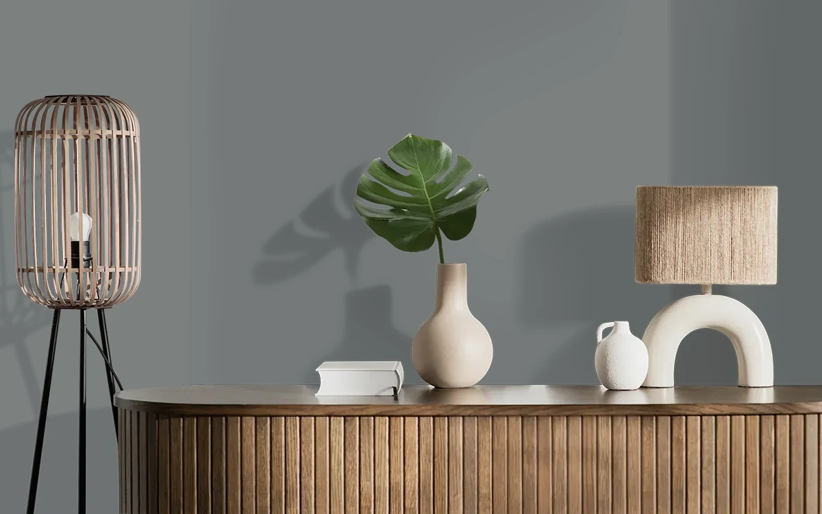 Nippon Paint's MOODY IRON color on different wall surfaces.