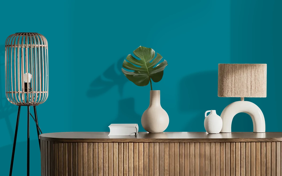 Nippon Paint's NAVAJO TURQUOISE color on different wall surfaces.