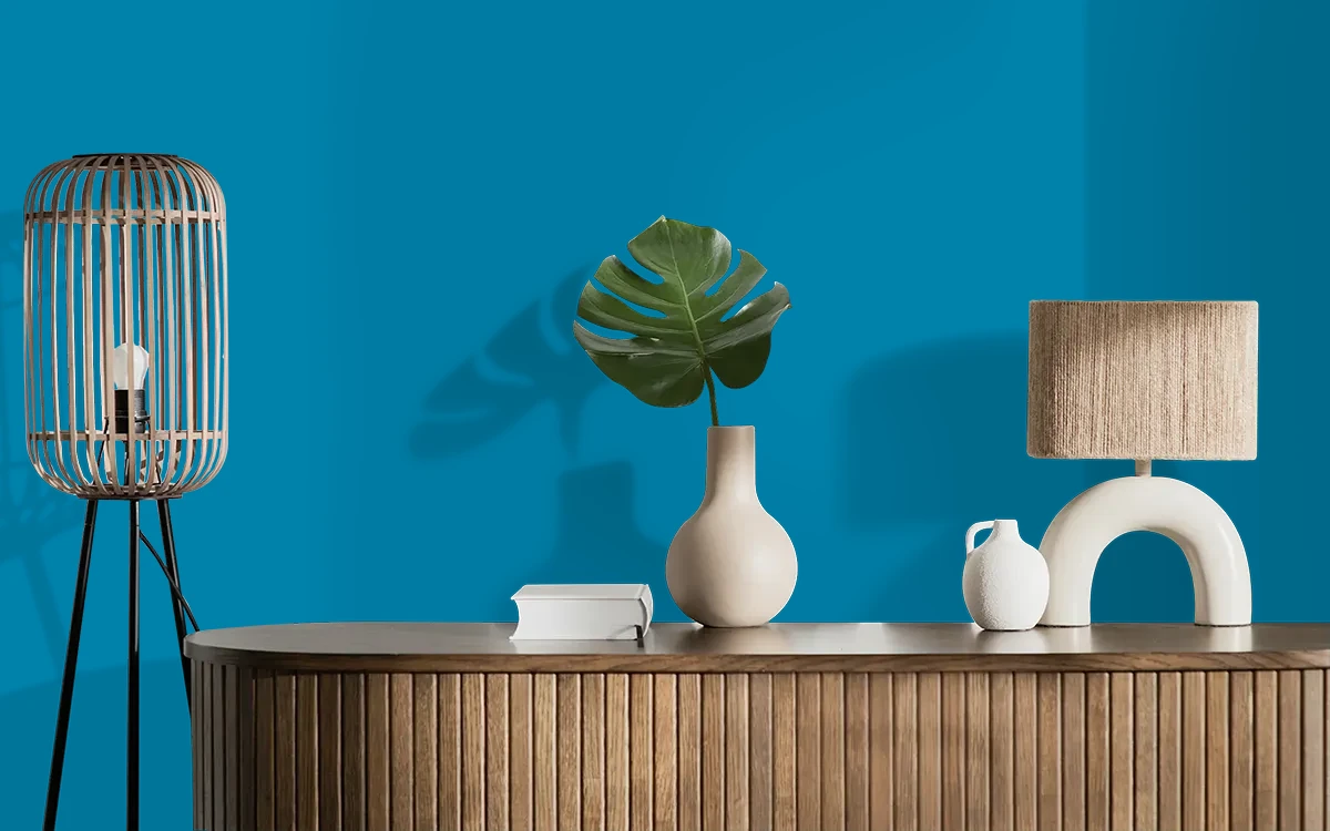 Nippon Paint's NORSE BLUE color on different wall surfaces.