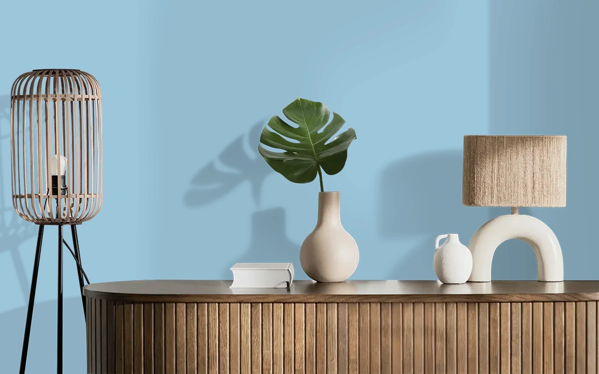Nippon Paint's NORTH BLUE color on different wall surfaces.