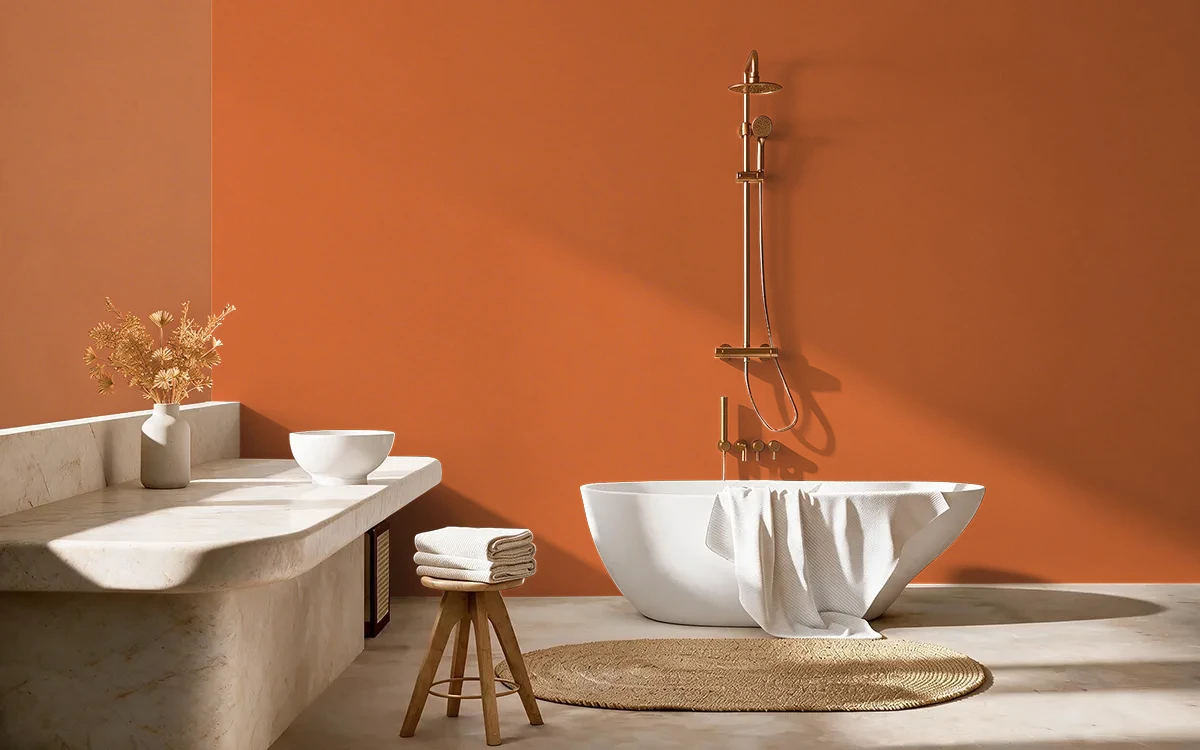 Nippon Paint's ORANGE FIESTA color on different wall surfaces.