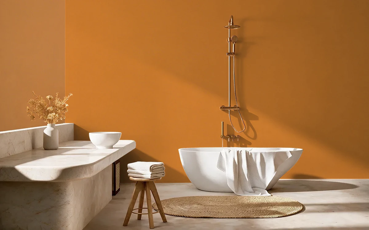 Nippon Paint's ORANGE ORIGINALITY color on different wall surfaces.