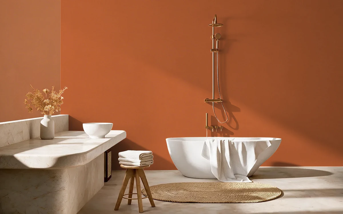 Nippon Paint's ORANGY EARTH color on different wall surfaces.