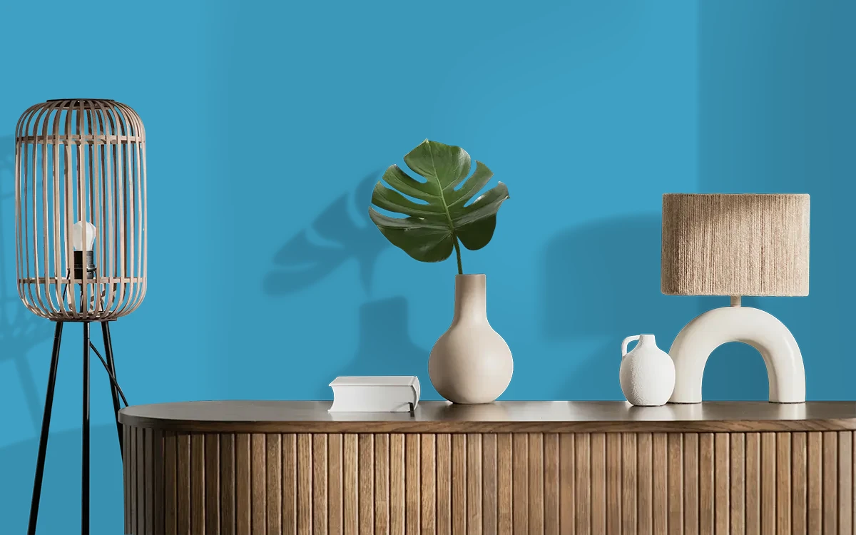 Nippon Paint's OUT AT SEA color on different wall surfaces.