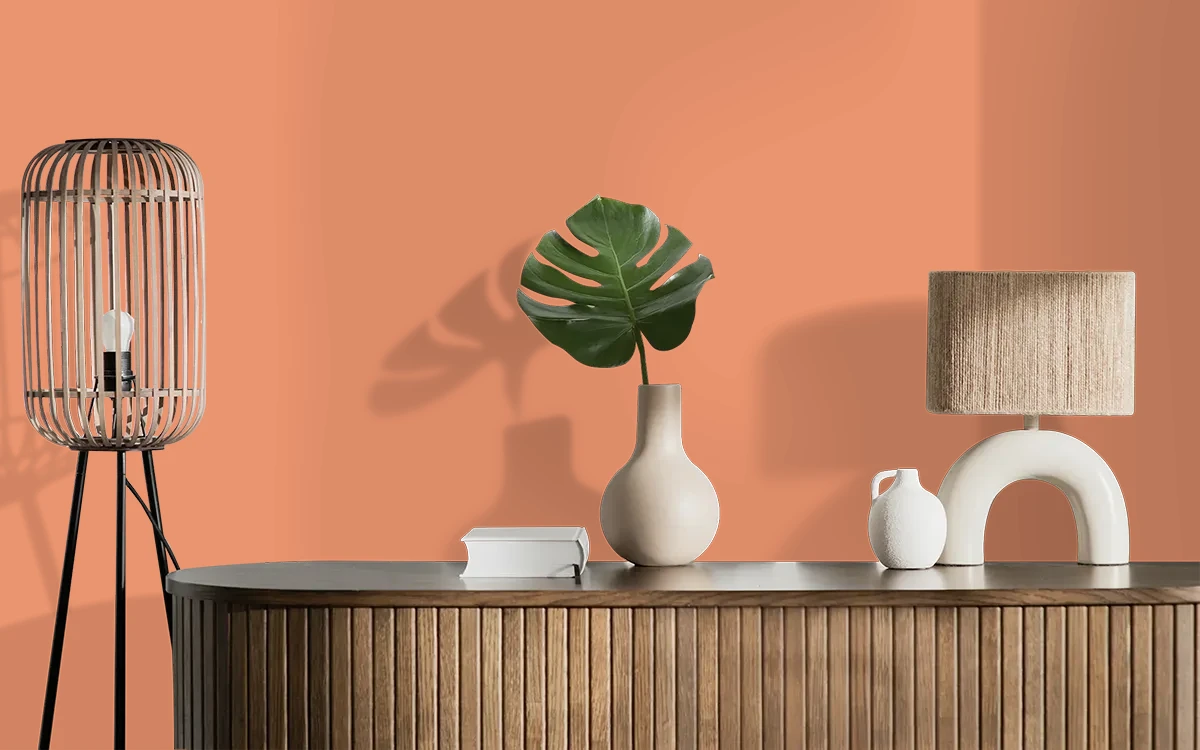 Nippon Paint's PAPAYA JUICE color on different wall surfaces.