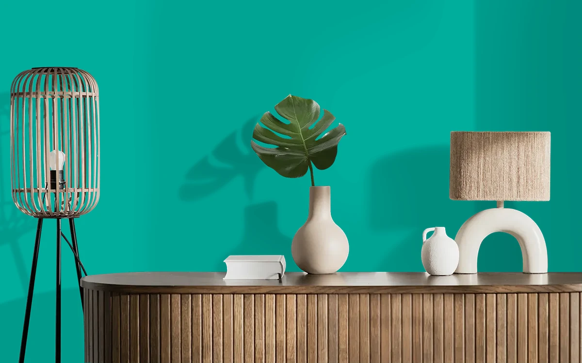 Nippon Paint's PARADISE WATERS color on different wall surfaces.