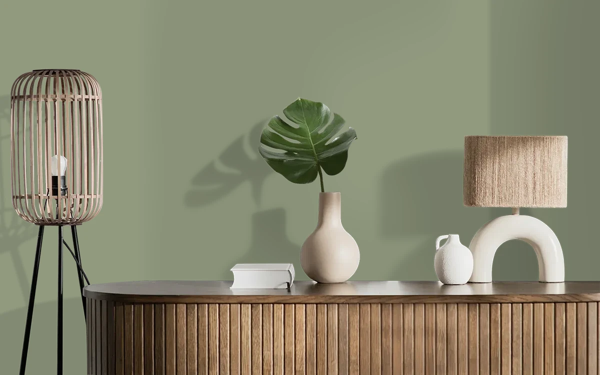 Nippon Paint's PARROT GREEN color on different wall surfaces.