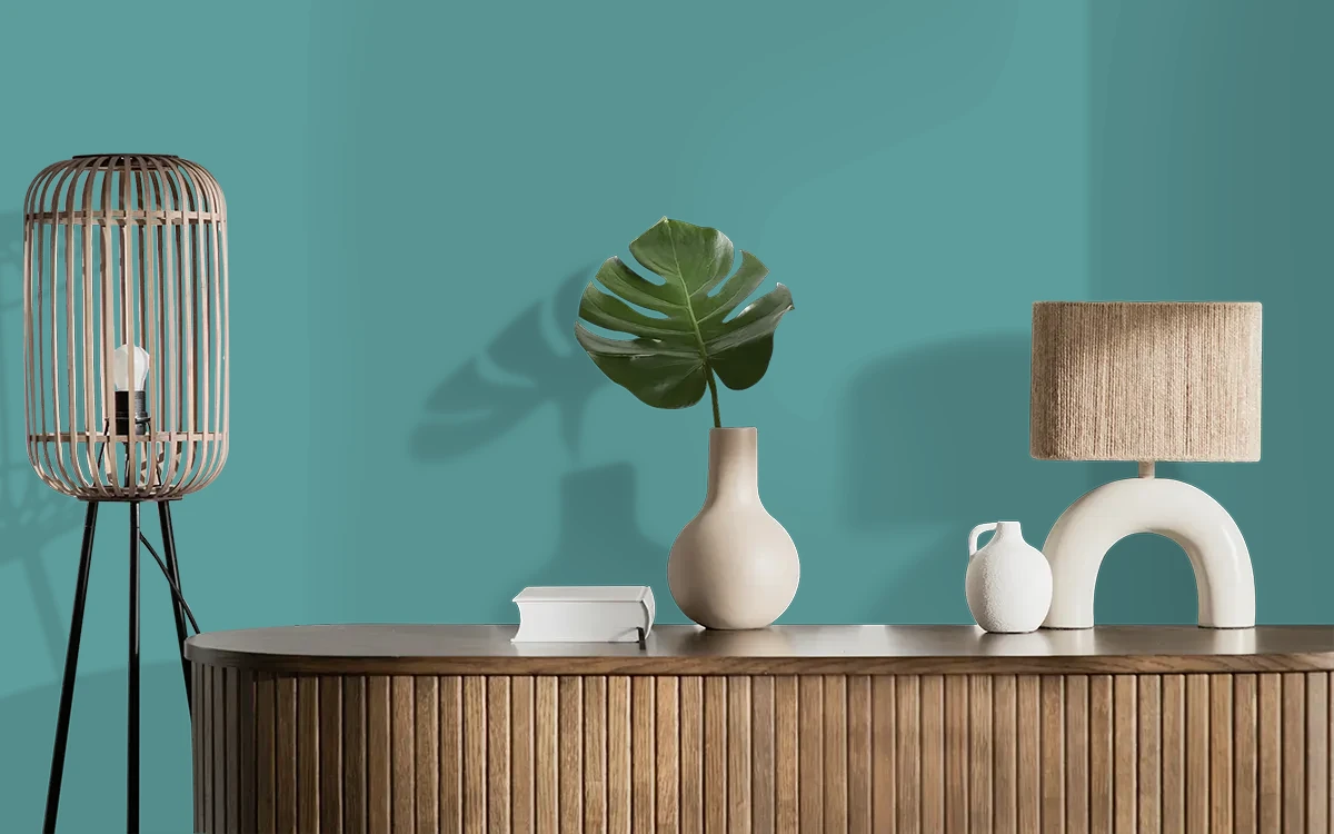 Nippon Paint's PEACOCK FEATHER color on different wall surfaces.