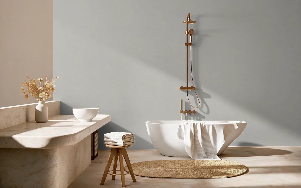 Nippon Paint's PEBBLE GREY color on different wall surfaces.