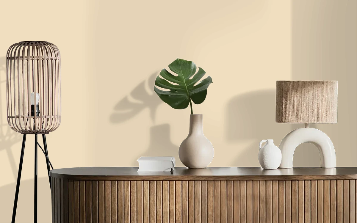 Nippon Paint's PERFUMED POWDER color on different wall surfaces.