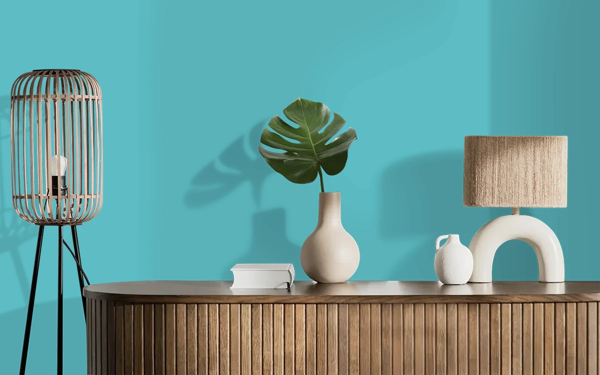 Nippon Paint's PERSIAN BLUE color on different wall surfaces.