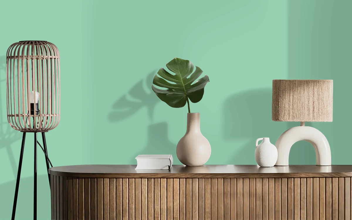 Nippon Paint's PINE RADIANCE color on different wall surfaces.