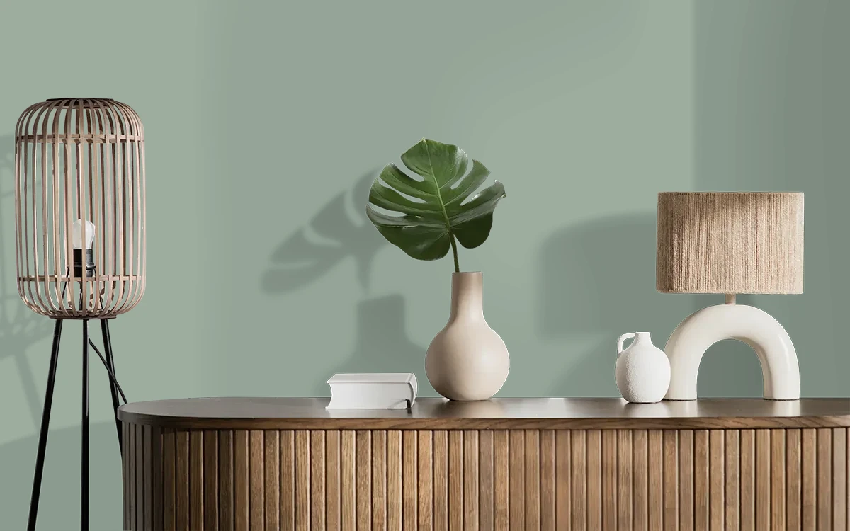 Nippon Paint's PINE WHISPER color on different wall surfaces.