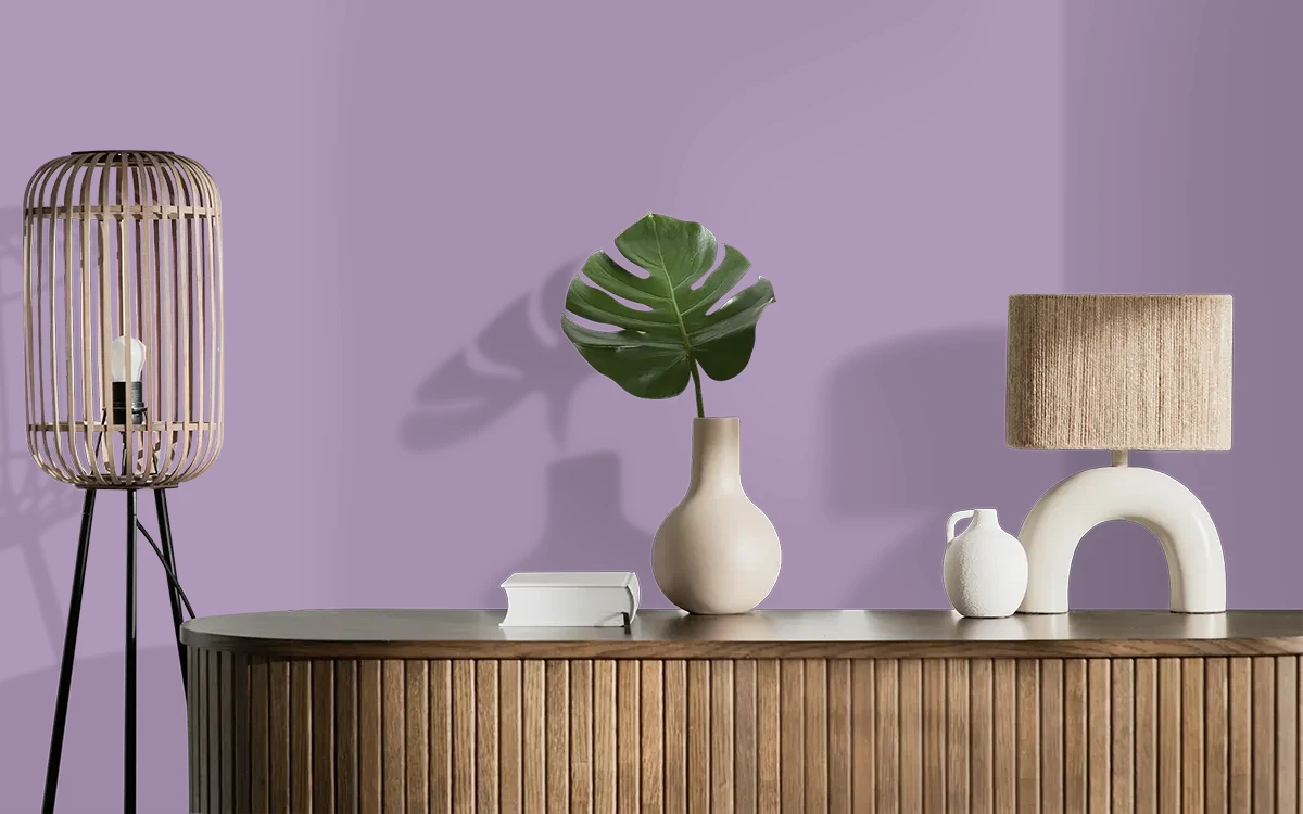 Nippon Paint's PLUM SPARKLE color on different wall surfaces.