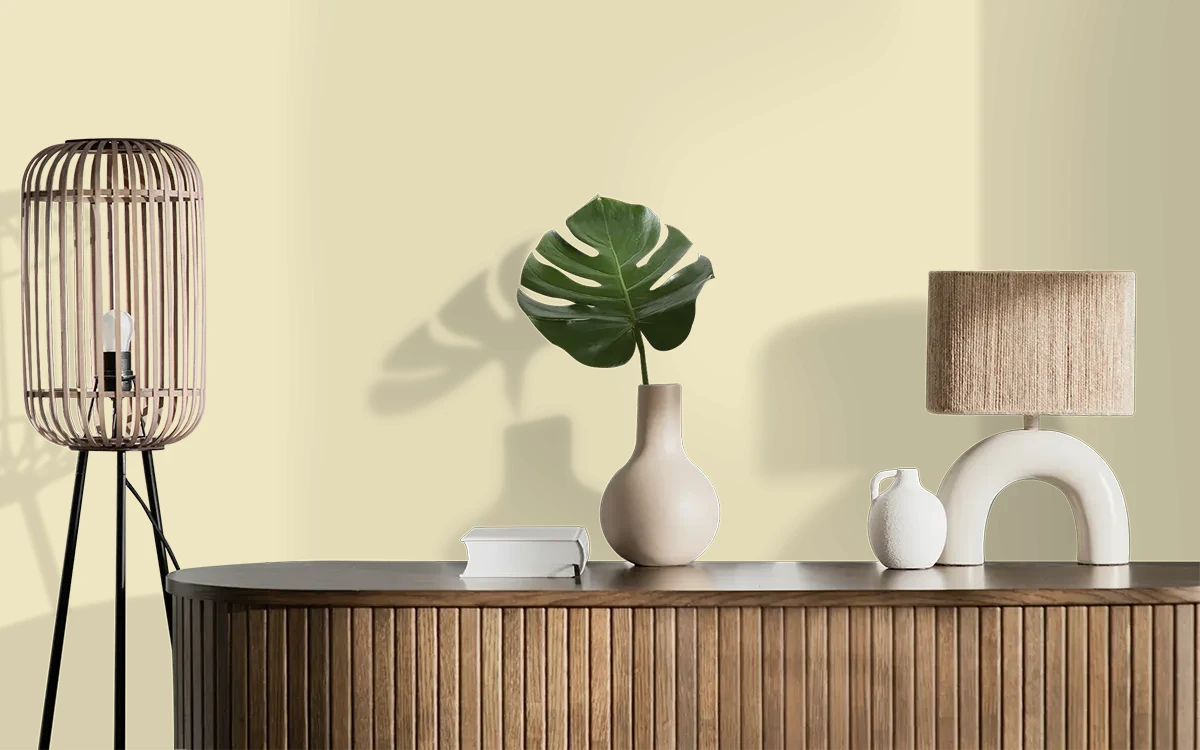 Nippon Paint's POWDER YELLOW color on different wall surfaces.