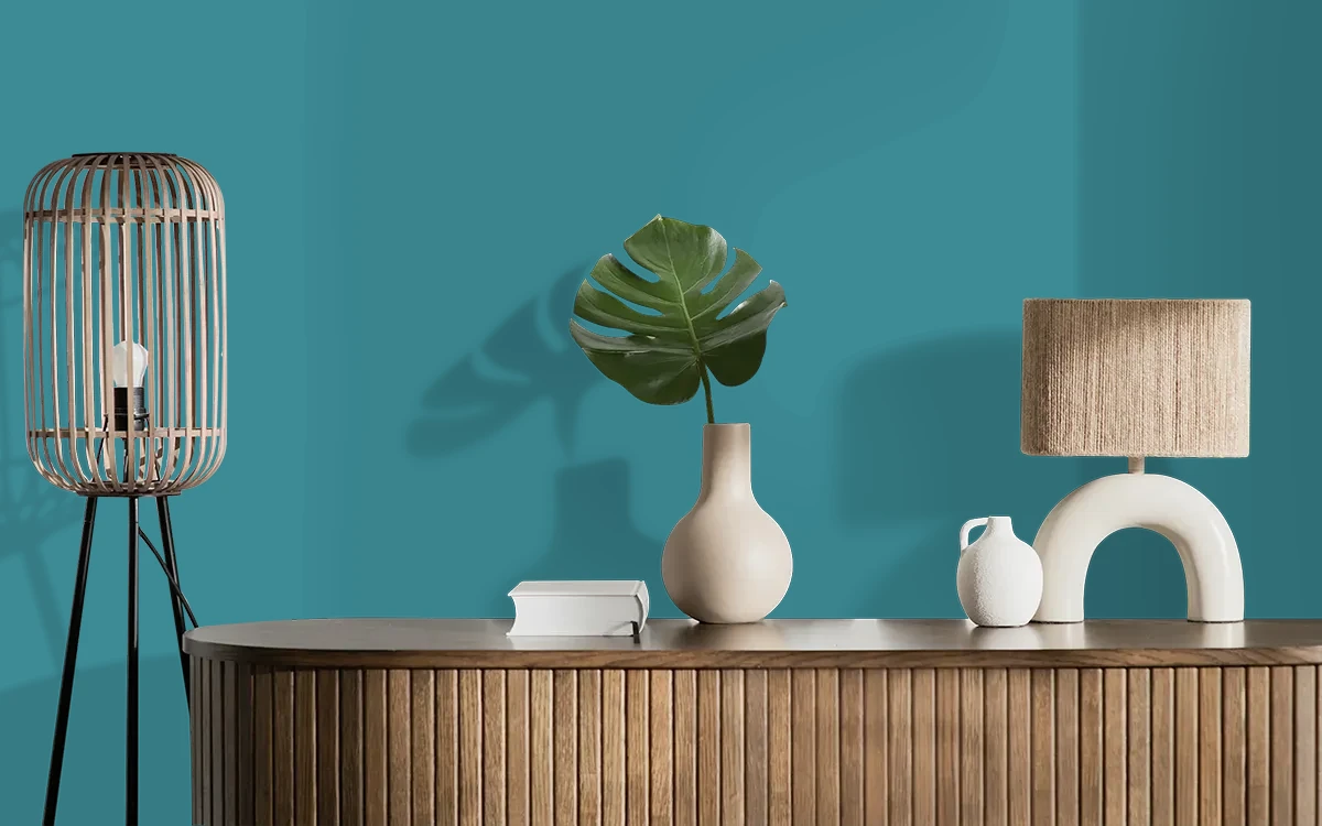 Nippon Paint's PUEBLO BLUE color on different wall surfaces.