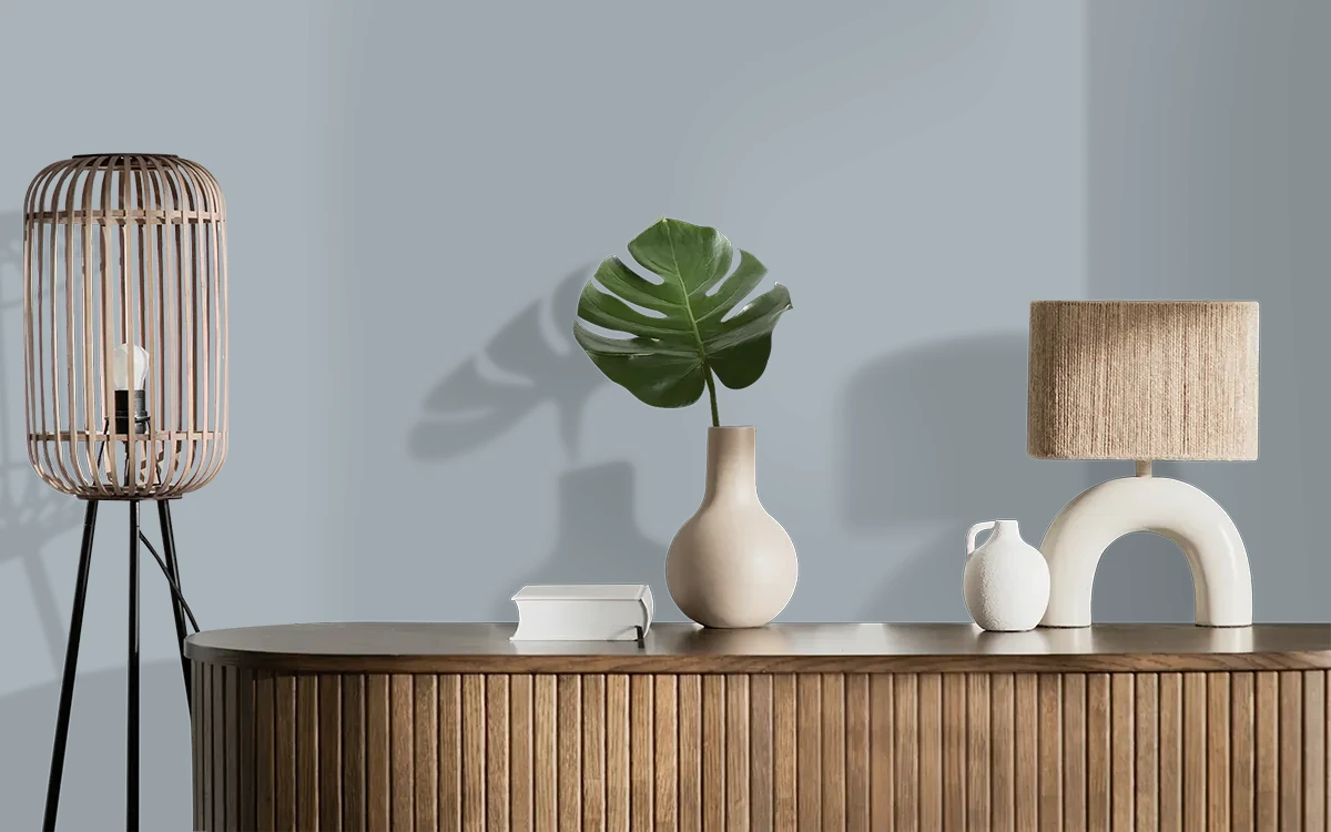 Nippon Paint's QUAKER GRAY color on different wall surfaces.