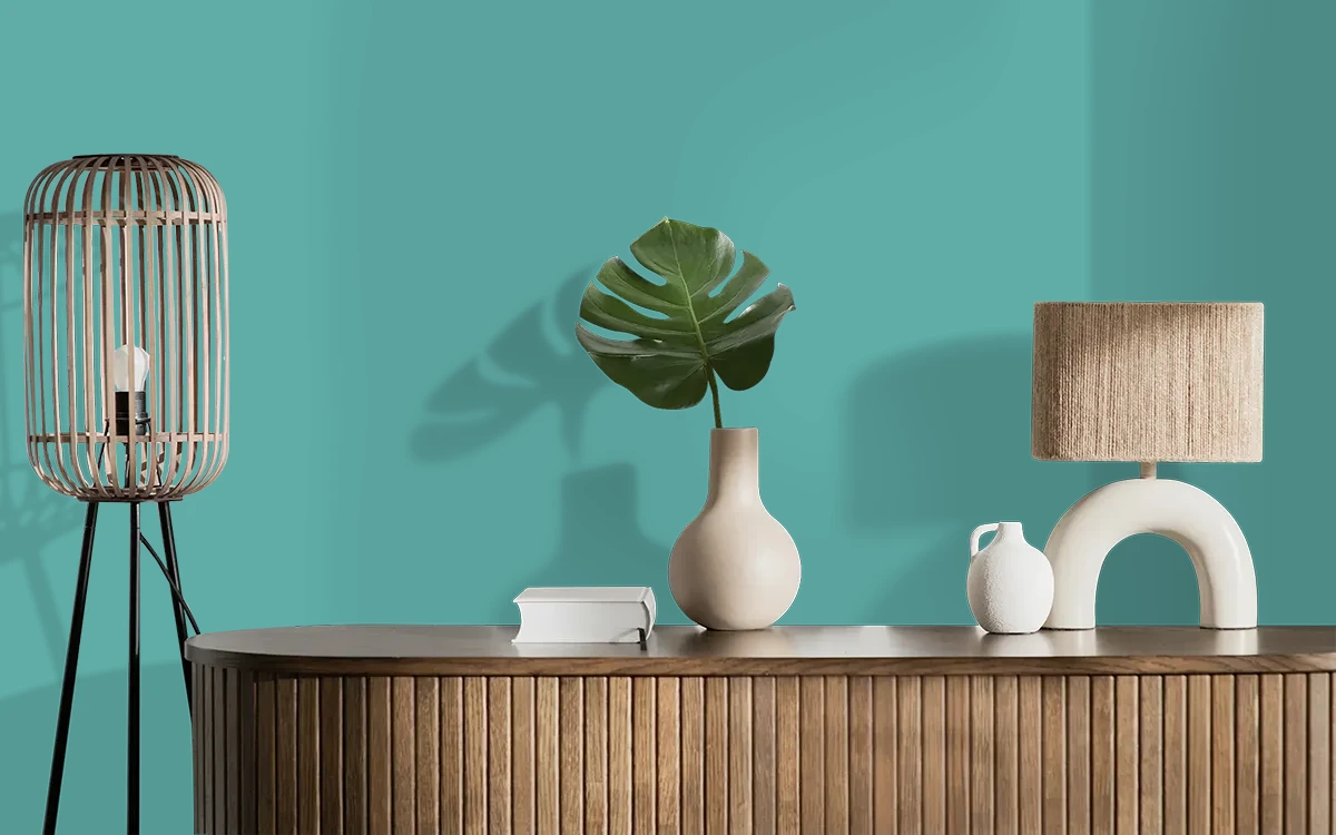 Nippon Paint's RAGING RIVER color on different wall surfaces.