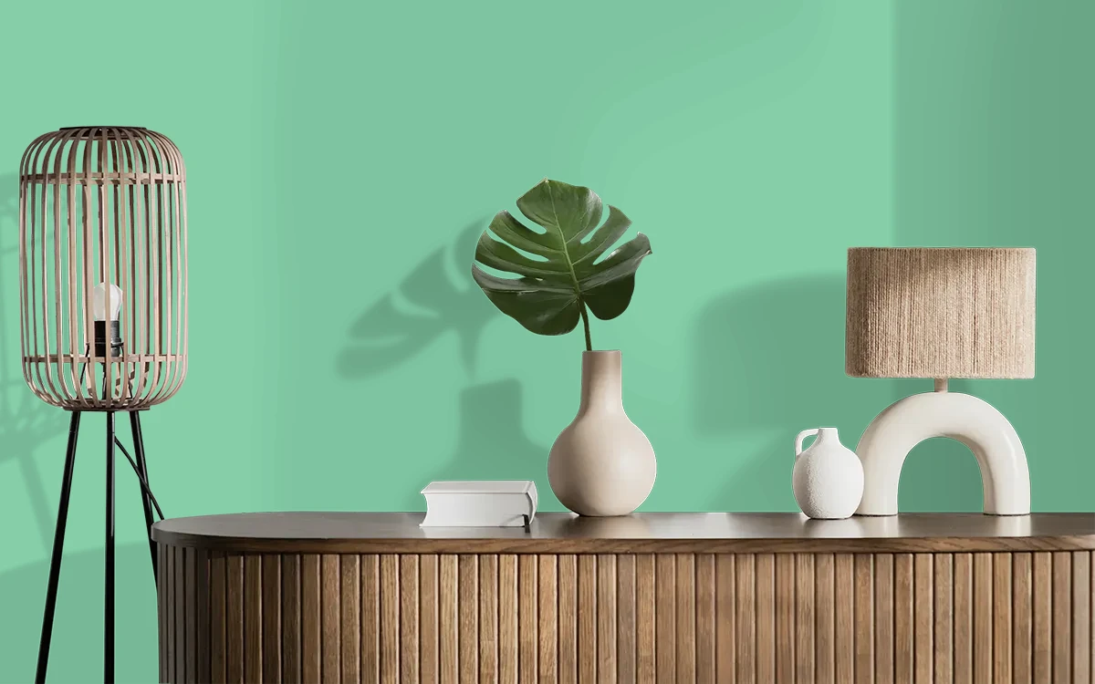 Nippon Paint's RESTFUL GREEN color on different wall surfaces.