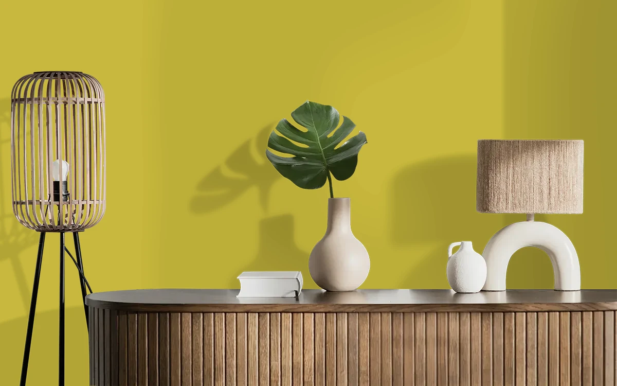 Nippon Paint's RICH MUSTARD color on different wall surfaces.