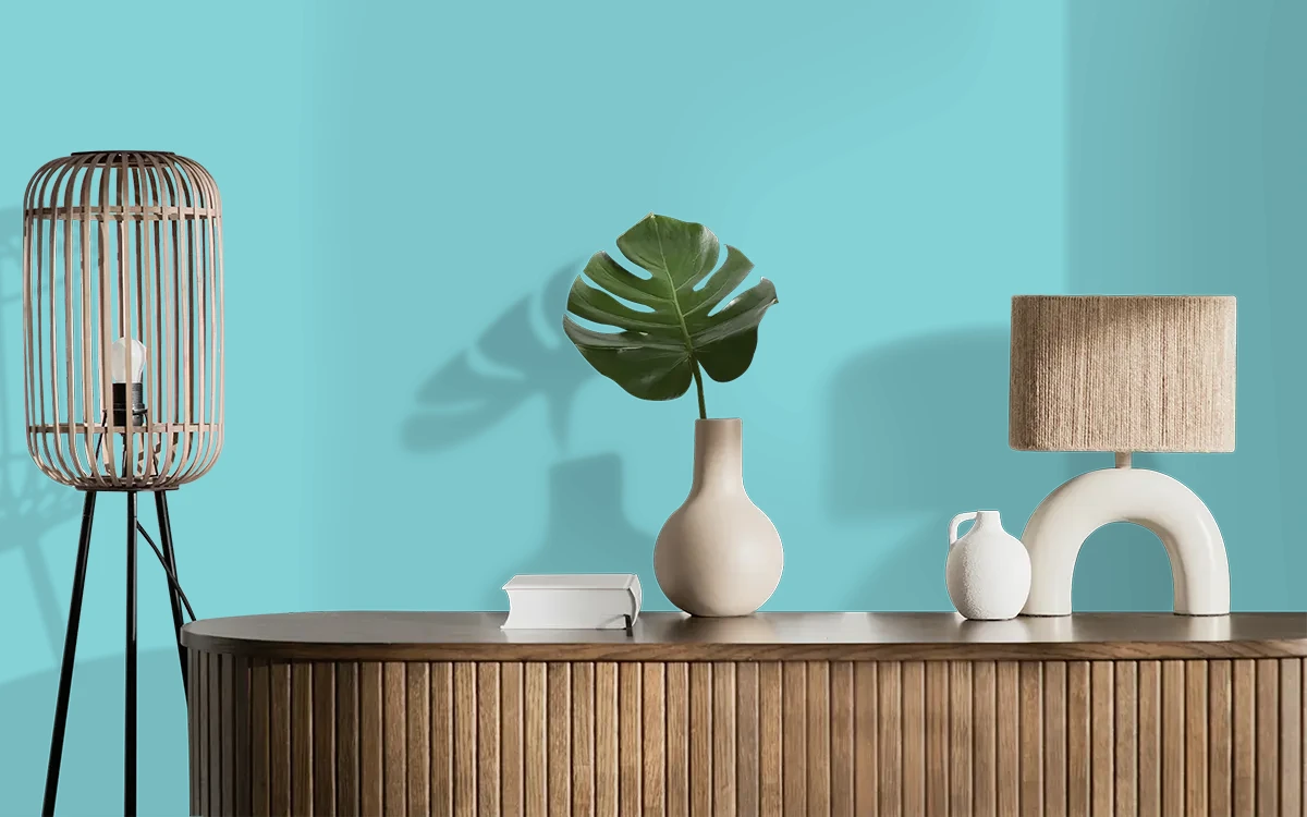 Nippon Paint's RISING TIDE color on different wall surfaces.