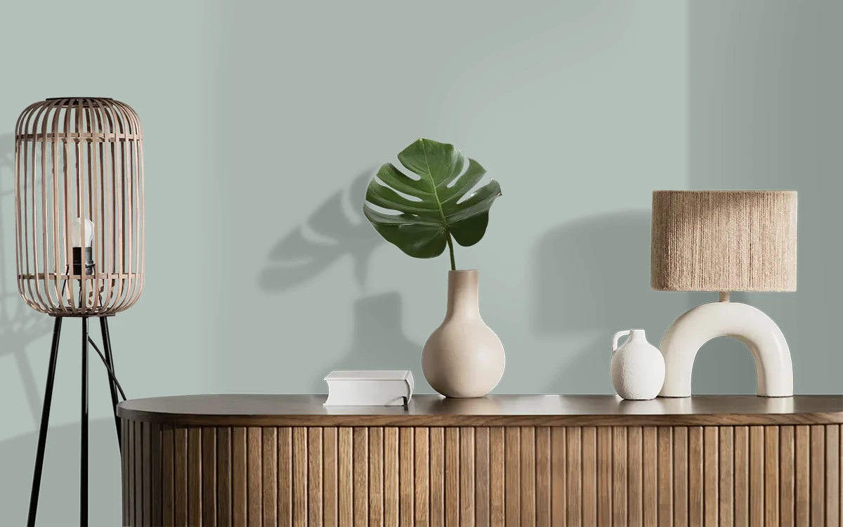 Nippon Paint's RIVER WATERS color on different wall surfaces.