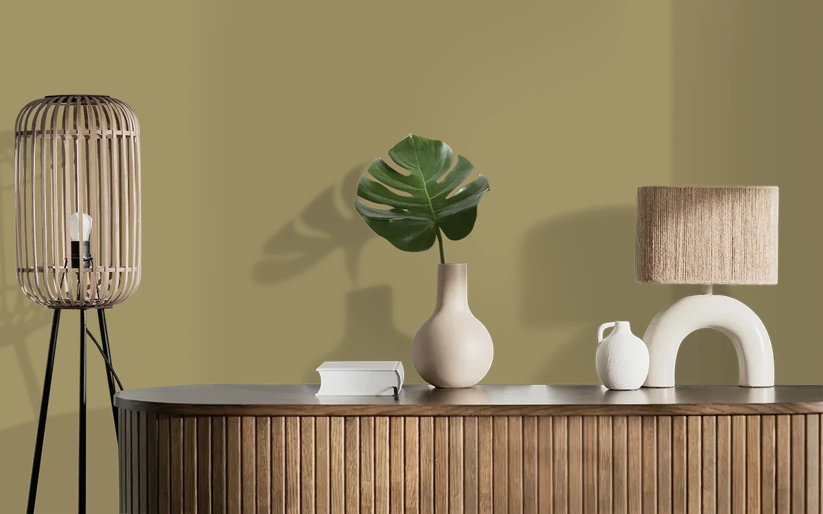 Nippon Paint's SANDLE TAN color on different wall surfaces.
