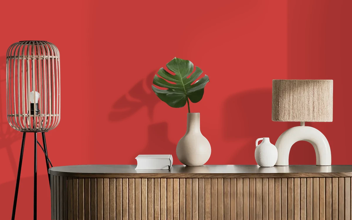 Nippon Paint's SASHAY RED color on different wall surfaces.