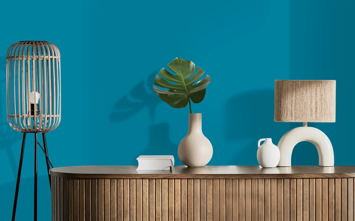 Nippon Paint's SAXONY BLUE color on different wall surfaces.