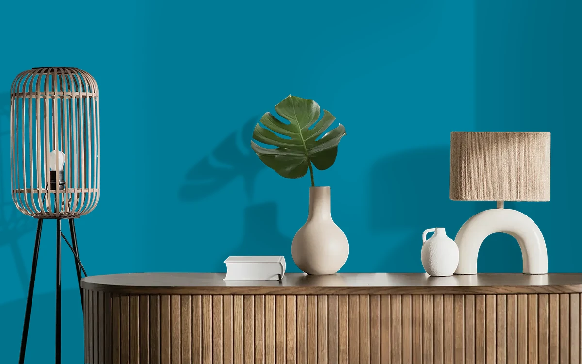 Nippon Paint's SAXONY BLUE color on different wall surfaces.