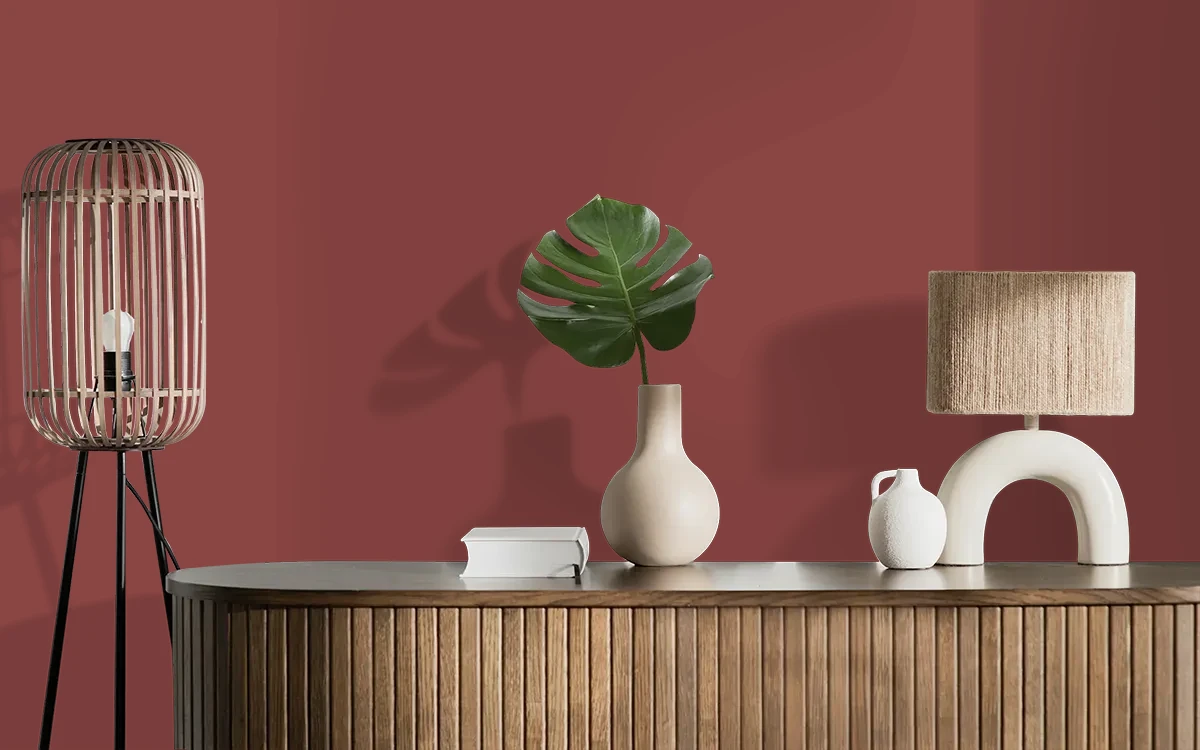 Nippon Paint's SCARLET OAK color on different wall surfaces.