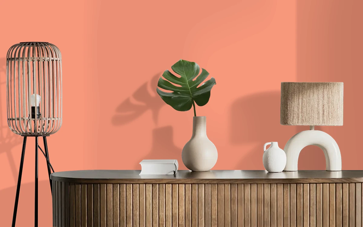 Nippon Paint's SEA OF CORAL color on different wall surfaces.