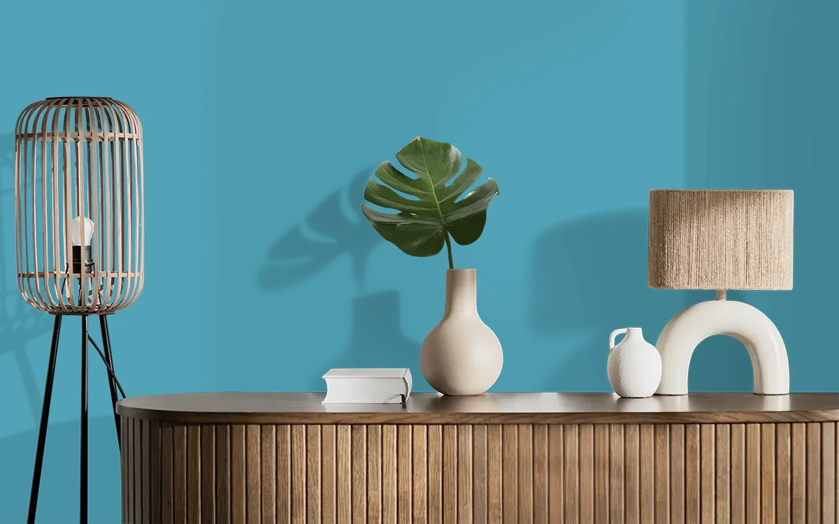 Nippon Paint's SEA VESSEL color on different wall surfaces.