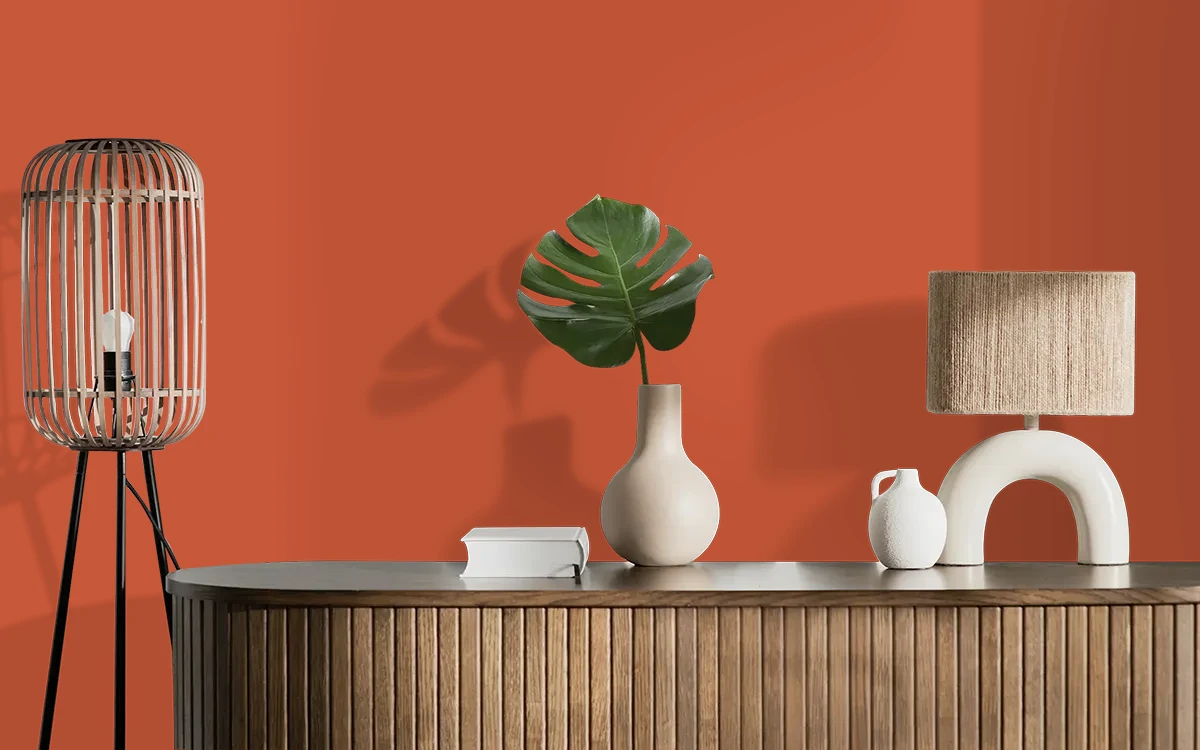 Nippon Paint's SETTING SUN color on different wall surfaces.