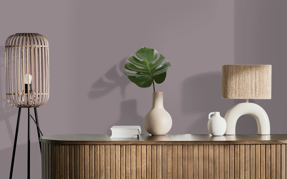 Nippon Paint's SMOKED VELVET color on different wall surfaces.