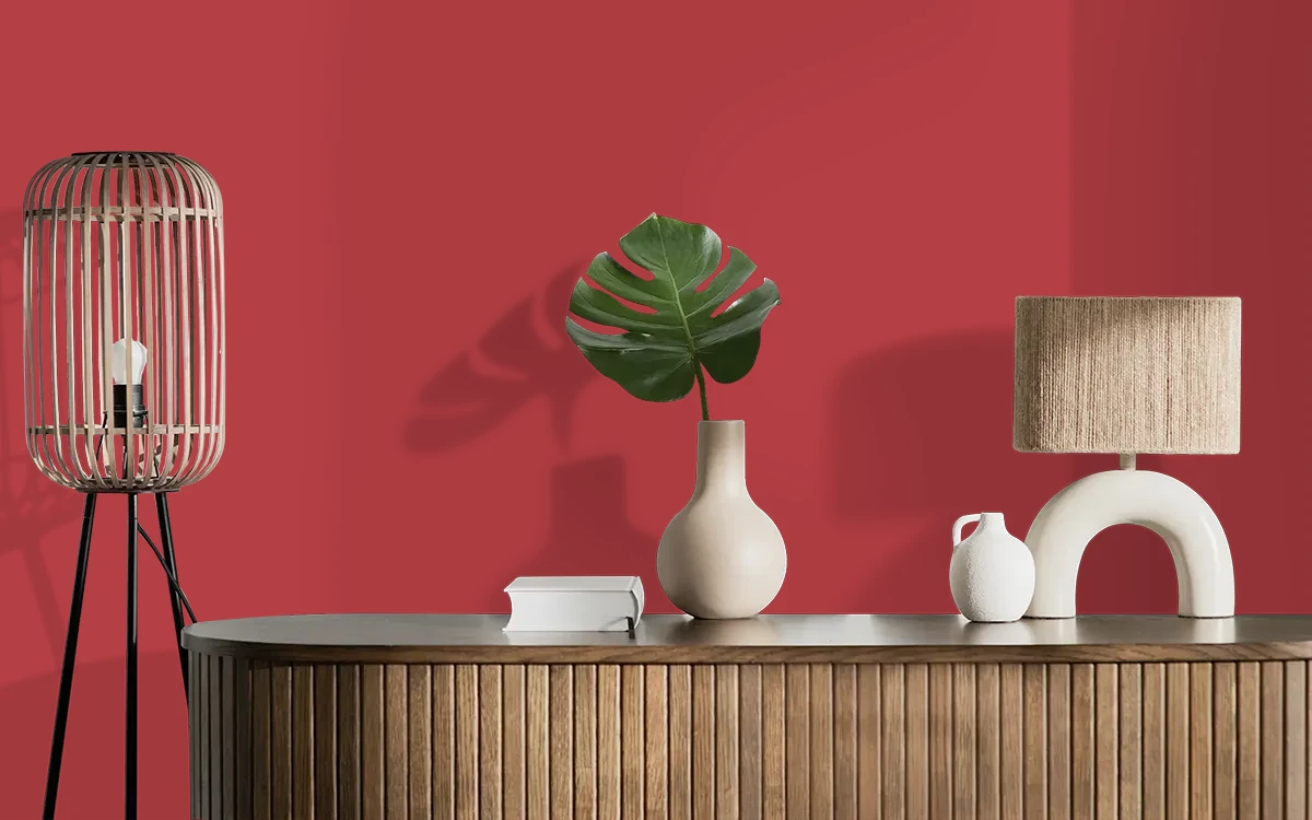 Nippon Paint's SPECTRUM RED color on different wall surfaces.