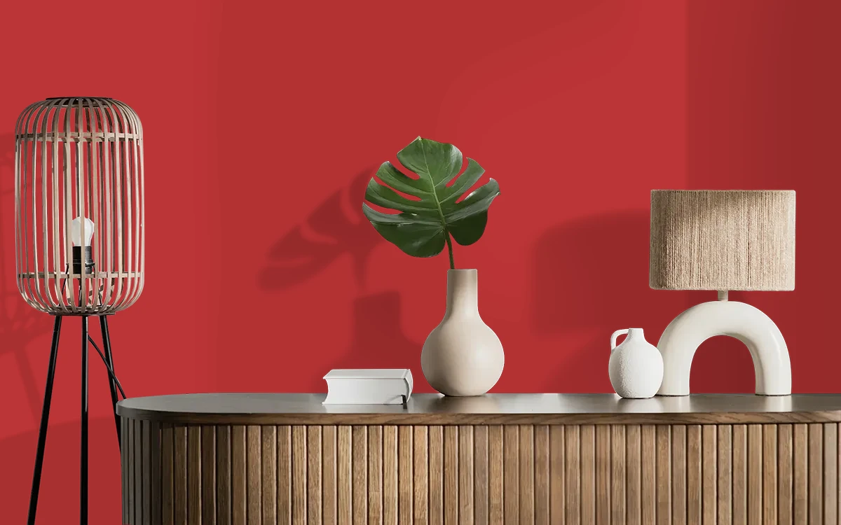 Nippon Paint's STARK RED color on different wall surfaces.