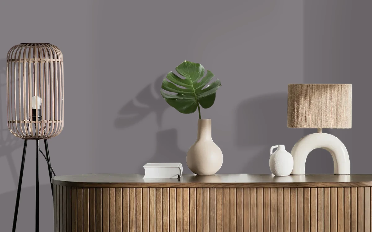 Nippon Paint's STONE BENCH color on different wall surfaces.