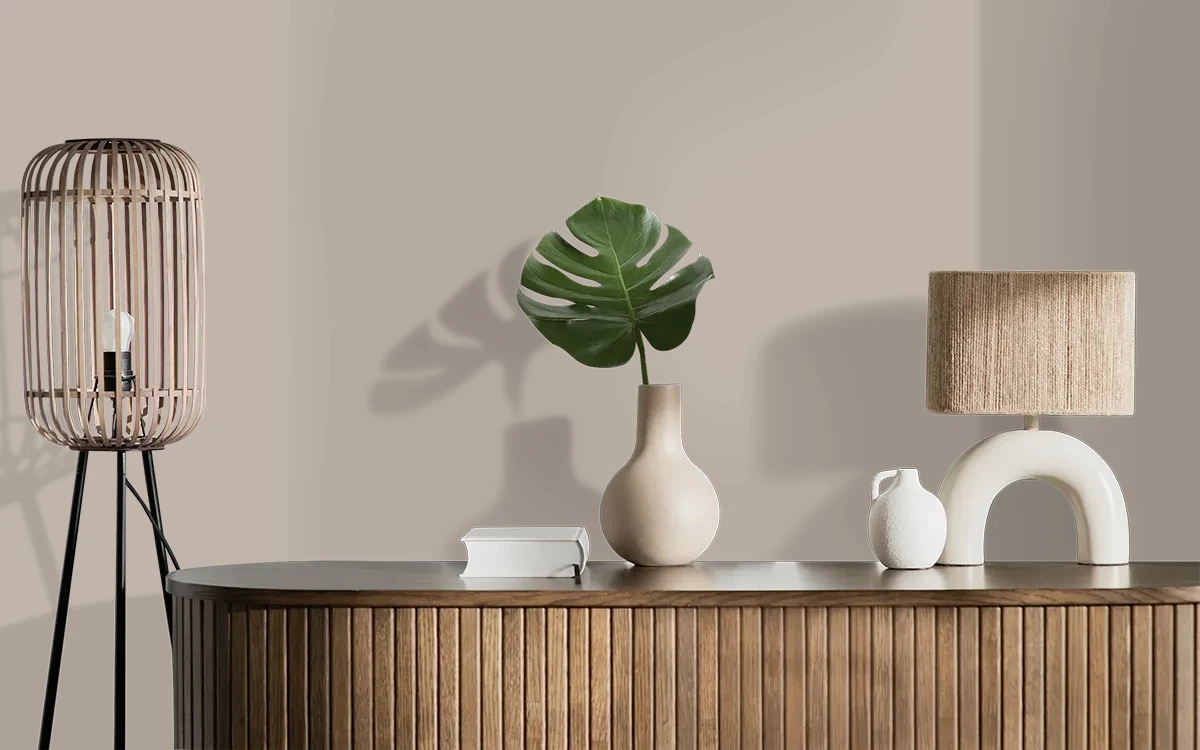 Nippon Paint's STONE STATUE color on different wall surfaces.